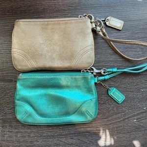 Two Coach wristlets
